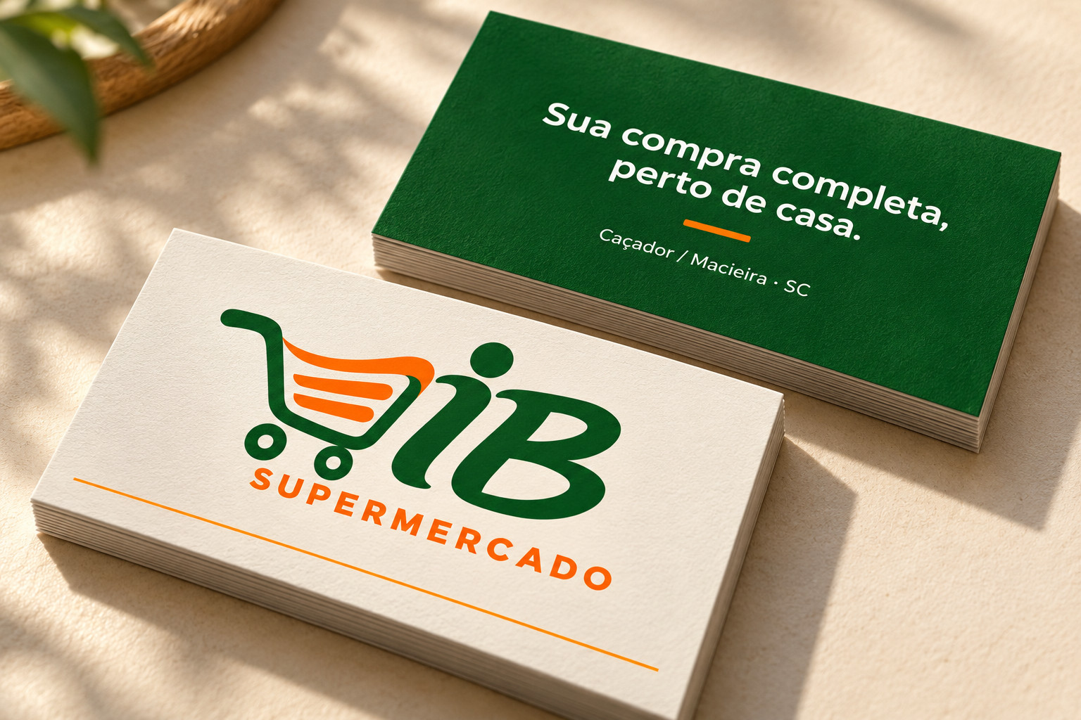 Cartões de visita do Supermercado IB em verde, laranja e branco